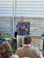 Pastor Jim preaching outdoors